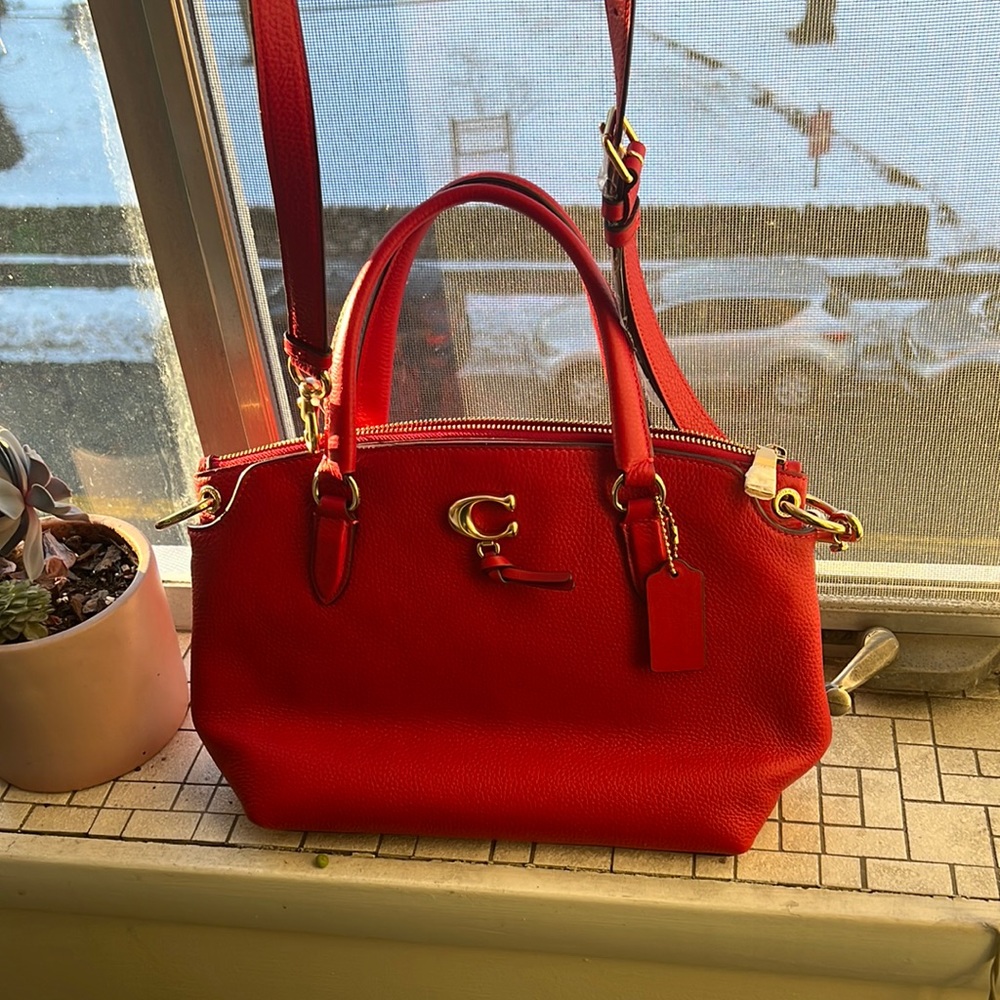 Brand new never worn Coach red genuine leather purse with handles and arm strap!